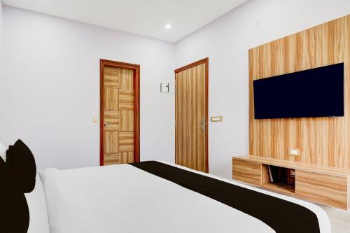 TV a/nebo společenská místnost v ubytování Hotel O Galaxy Inn