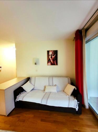 Ένα ή περισσότερα κρεβάτια σε δωμάτιο στο N2 Spacious cozy flat near Divonne center