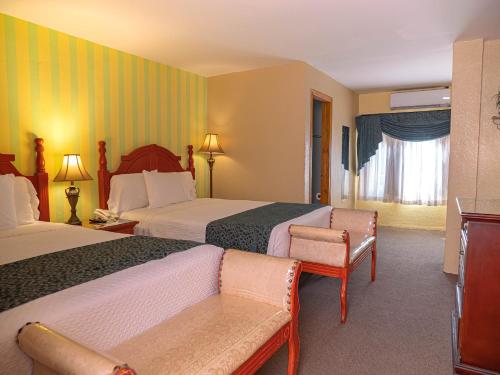 Postel nebo postele na pokoji v ubytování Boutique Hotel La Cordillera