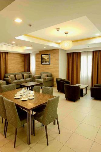 Χώρος καθιστικού στο JMM Grand Suites