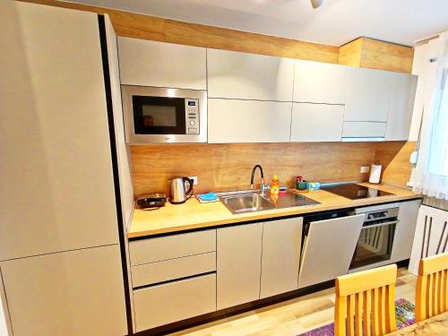 Foto LuxApart Cobanija City Centar free garage parking 4