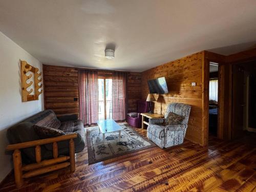 Posezení v ubytování Riverfront Cabin 2