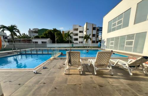 Hồ bơi trong/gần Exclusivo apto con piscina y vista al mar
