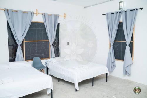 Cama o camas de una habitación en Casa Vainilla - Privacy, Best For Families, Tecolutla