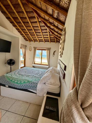 Ένα ή περισσότερα κρεβάτια σε δωμάτιο στο Casa Waltako