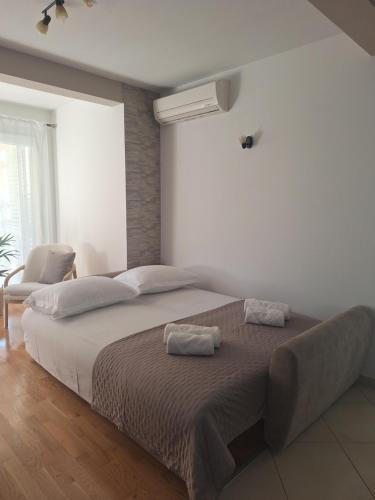 Postel nebo postele na pokoji v ubytování Apartman Amarea Makarska