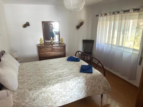 Ένα ή περισσότερα κρεβάτια σε δωμάτιο στο Casa das Quelhas