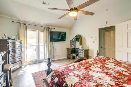 a bedroom with a bed and a ceiling fan at Residential Cul-De-Sac Suburban Memphis Hideaway! in Lakeland