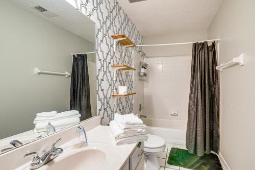 a bathroom with a sink and a toilet at Residential Cul-De-Sac Suburban Memphis Hideaway! in Lakeland