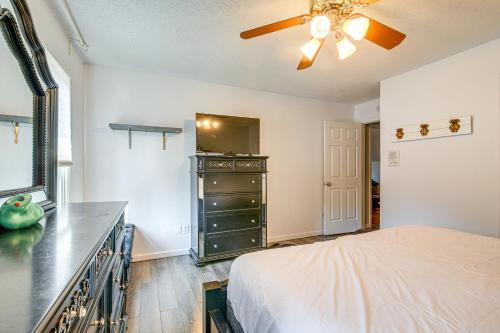 a bedroom with a bed and a ceiling fan at Residential Cul-De-Sac Suburban Memphis Hideaway! in Lakeland
