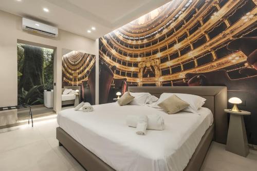 Postel nebo postele na pokoji v ubytování Lolli Boutique & SPA Al Massimo