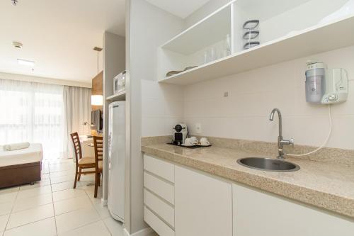 a kitchen with a sink and a counter top at BSB STAY Flats Particulares - Fusion in Brasilia