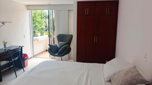 Кровать или кровати в номере Hotel Villa Park Real