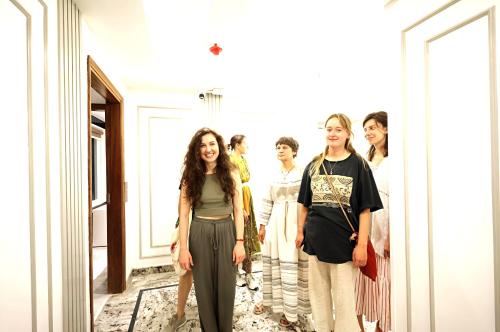 a group of women standing in a hallway at Hotel Star Pink' Couple friendly'Near rk ashram metro in New Delhi
