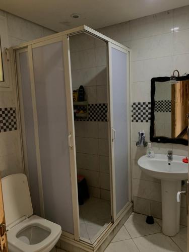 Ένα μπάνιο στο Résidence sara