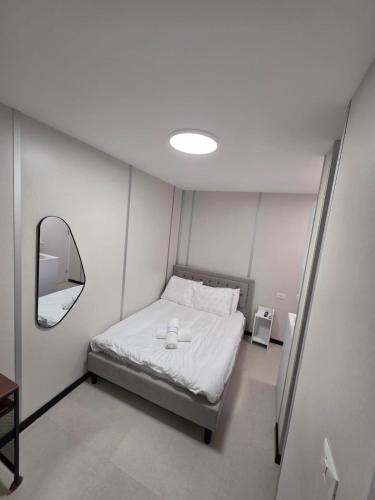 Postel nebo postele na pokoji v ubytování Ryo 40 Studio apartment 5 minutes from the beach