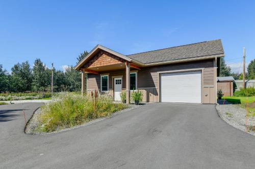 a house with a driveway with a garage at 2 Mi to Dtwn Palmer Custom Valley Home with Garage in Palmer