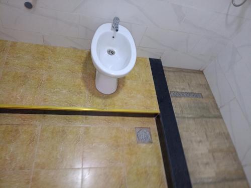 Et badeværelse på Location Appartement avec Piscine