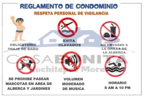a bunch of signs on a sign with a child at CASABONITA fte alberca, AirAc in Alpuyeca