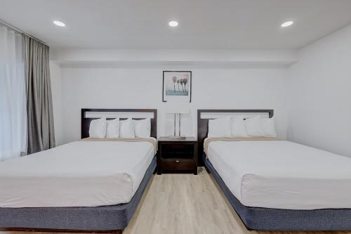 Katil atau katil-katil dalam bilik di Hotel Ash&9th