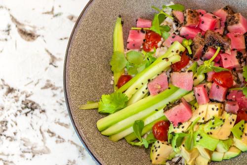 a plate of food with broccoli and other vegetables at Villa del Palmar Cancun Luxury Beach Resort & Spa in Cancún