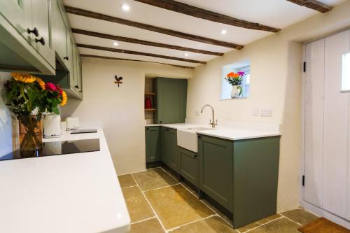 Kuchyň nebo kuchyňský kout v ubytování Newport cottage