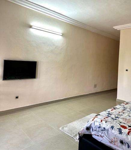 Postel nebo postele na pokoji v ubytování Spacious Private Room In Cotonou