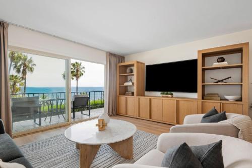 Et tv og/eller underholdning på SeaCliff - Solmar by Paradise Retreats