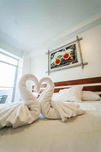 Postel nebo postele na pokoji v ubytování Hotel Suisui