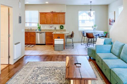 a living room with a couch and a table at Pikes Peak West in Flagstaff