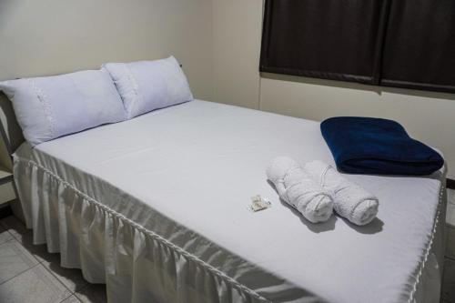 Giường trong phòng chung tại Hotel Minarini