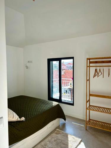 Postel nebo postele na pokoji v ubytování Casa Happy