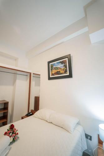 Postel nebo postele na pokoji v ubytování Hotel Suisui