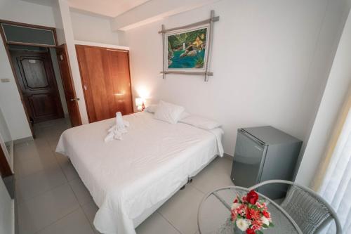 Postel nebo postele na pokoji v ubytování Hotel Suisui
