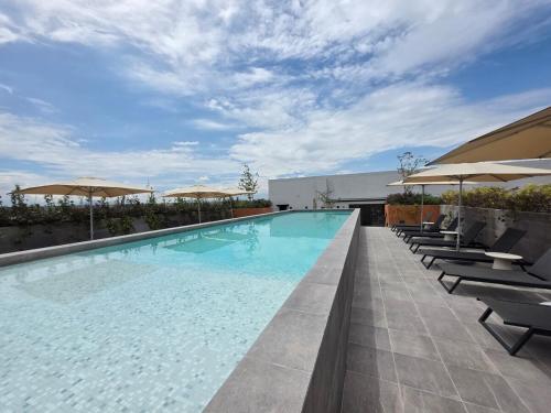 Πισίνα στο ή κοντά στο Cozy retreat bright spacious and calm