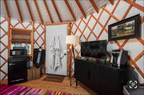 a room with a door in a yurt at Rustic Luxe Yurt- Unit #1 in Woodway