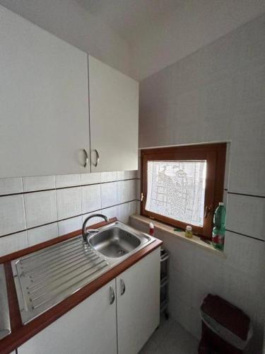 Dapur atau dapur kecil di Via Liguria 15 Guest House