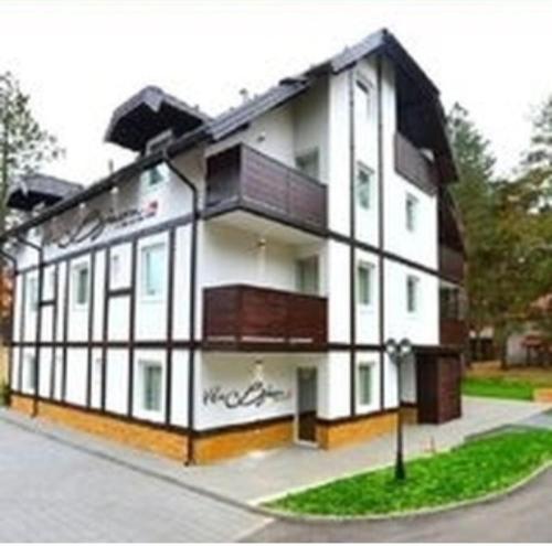 a rendering of a white building at Vila Bjanka in Zlatibor