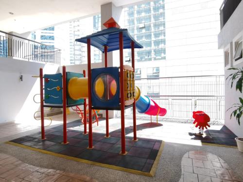 a playground in the middle of a building at Seri Bukit Ceylon Kuala Lumpur in Kuala Lumpur