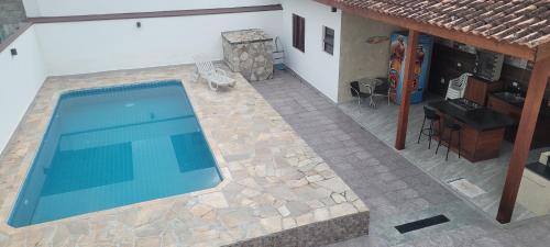 Bazén v ubytování BareSun casa para 12 pessoas em Barequeçaba nebo v jeho okolí