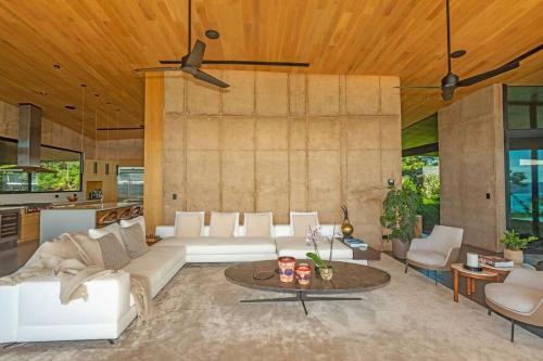 a living room with a couch and a table at Villa Coral in Nacascolo