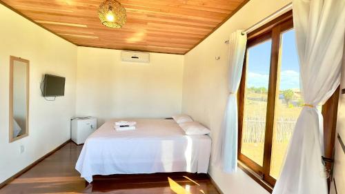 Postel nebo postele na pokoji v ubytování Sun Beach Macapa