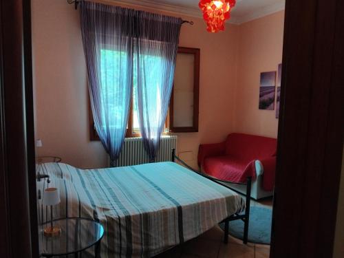 Postel nebo postele na pokoji v ubytování 051 Bologna Appartamento