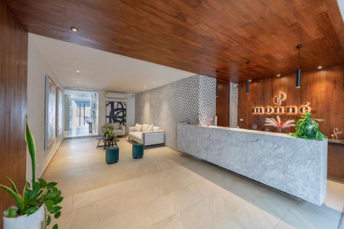 a lobby with a sign that reads mongolia at Monne departamento de lujo en Mérida, Planta baja in Mérida
