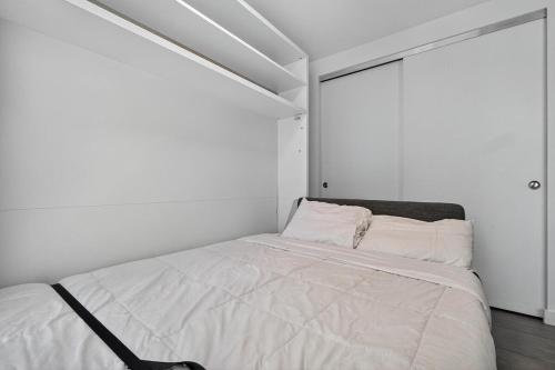 Postel nebo postele na pokoji v ubytování Modern Studio Downtown Miami