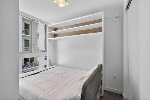 Postel nebo postele na pokoji v ubytování Modern Studio Downtown Miami