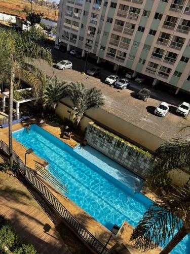 Kolam renang di atau dekat dengan Apto aconchegante com piscina aquecida, garagem e metrô próximo