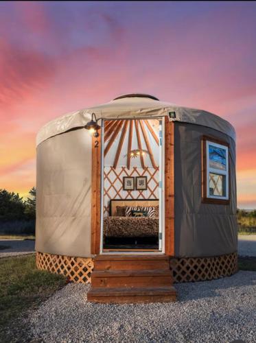 a dome tent sitting on the side of a road at Jungle Haven Yurt- Unit #2 in Woodway