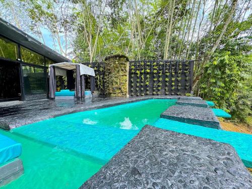 a swimming pool in the backyard of a house at Luxury Cabin Eleven Eleven in San Rafael