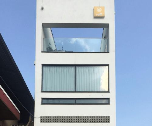 a white building with a window on the side of it at Gyeongju Stayrophy Eupseong Branch in Gyeongju